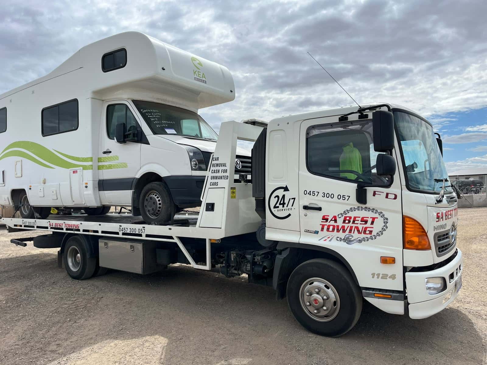 Volkswagen-based motorhome with an over-cab sleeper strapped on the SA Best Towing tilt tray